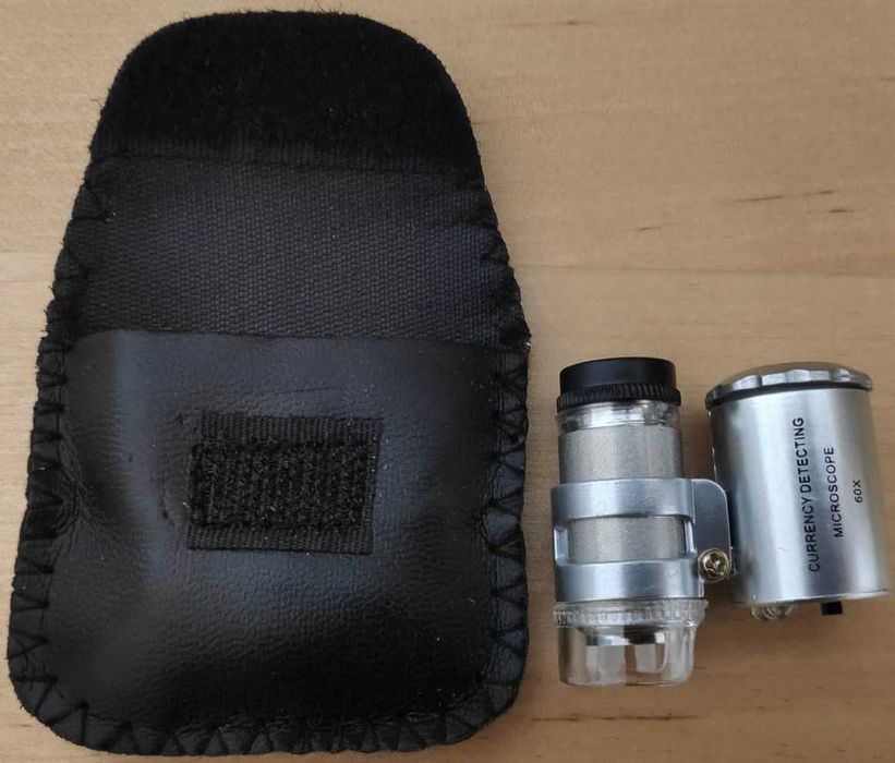 Magnifying glasses and microscope with illumination.64584318313858121