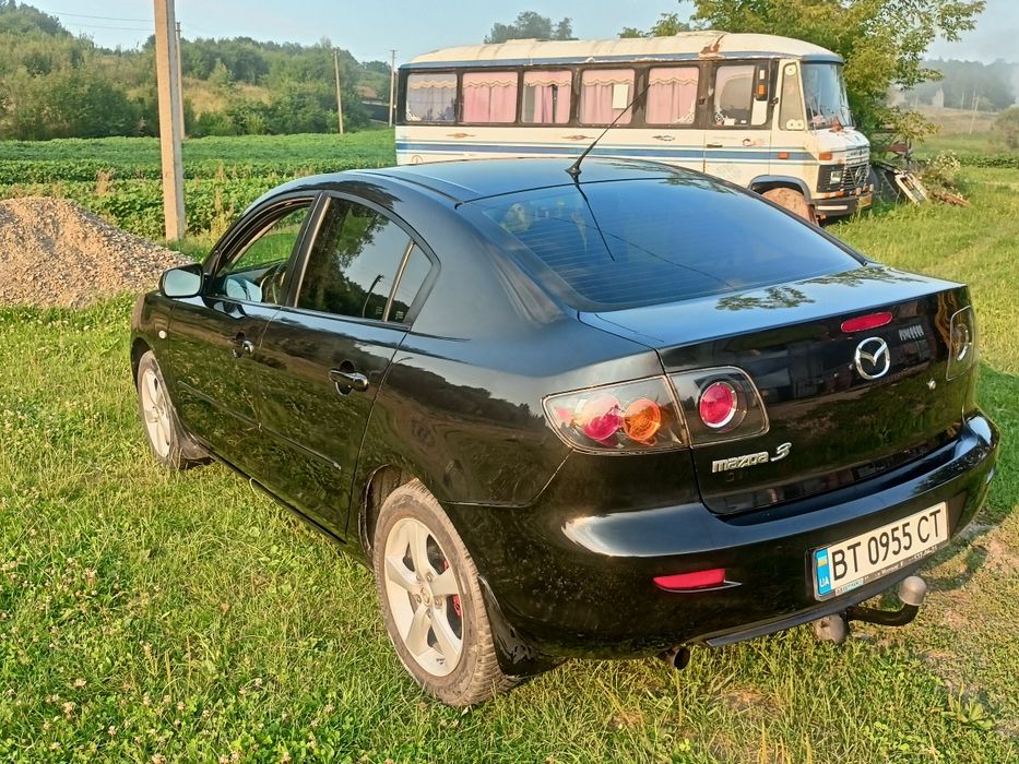 Мазда 3.2006 року