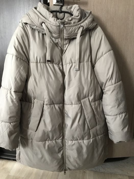 Пуховик теплий та комфортний