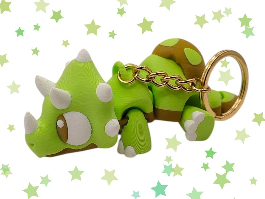 Brelok dinozaur triceratops zielony uroczy dodatek ruchomy breloczek