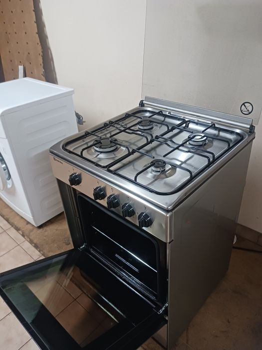 Vendo Fogão de inox meireles semi novo em excelente estado possibilida
