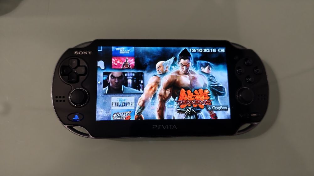 PS vita oled com jogos instalados muito bom estado