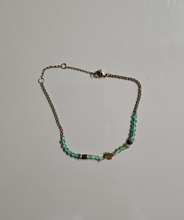 Pulseira em aço dourado