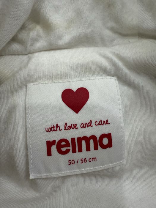 Reima пуховий конверт комбінезон