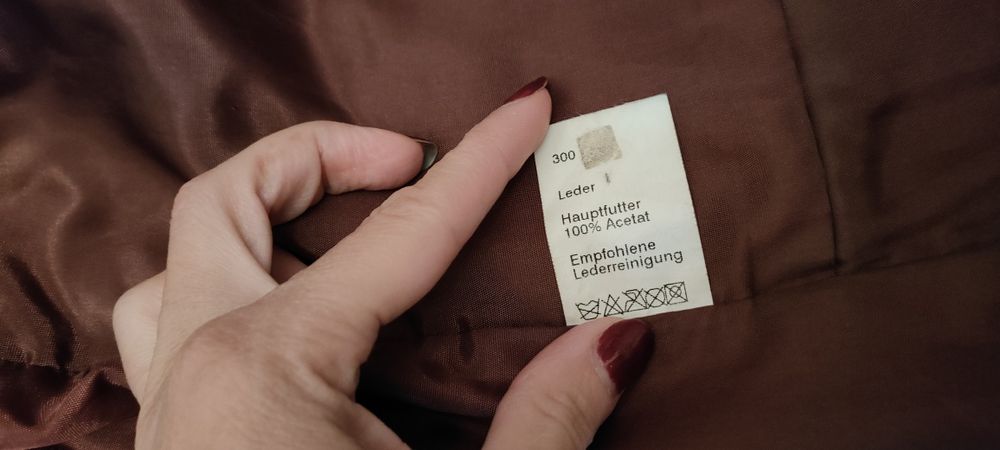 Жилетка шкіряна з гаманцями