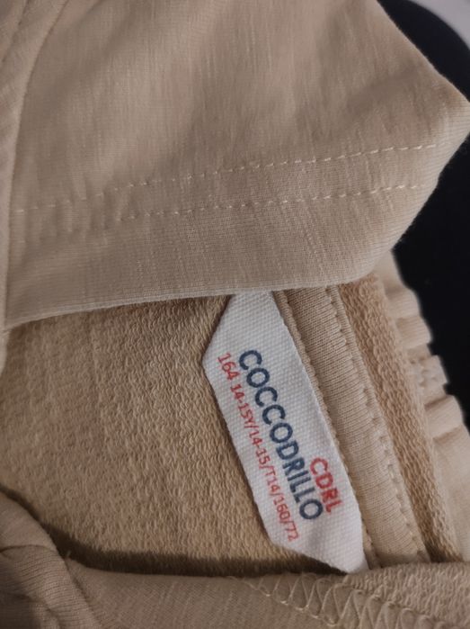 Dres dziewczęcy  jasno- beżowy COCCODRILO rozm. 164