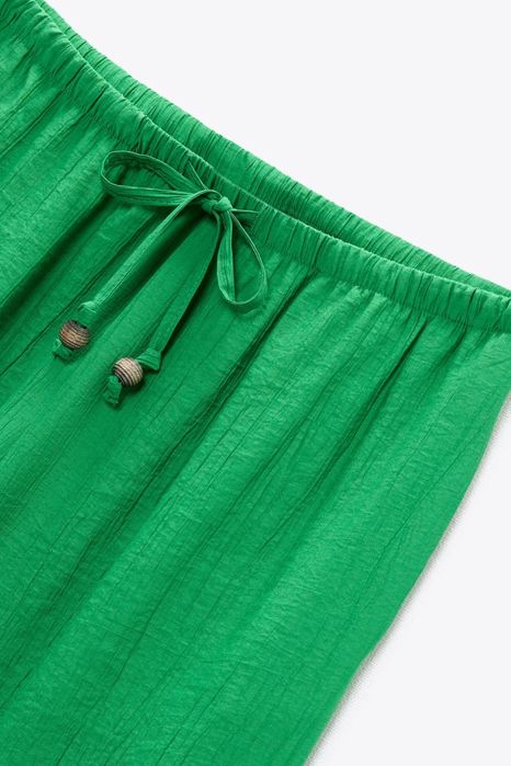 Широкі літні жаті штани зелені Zara