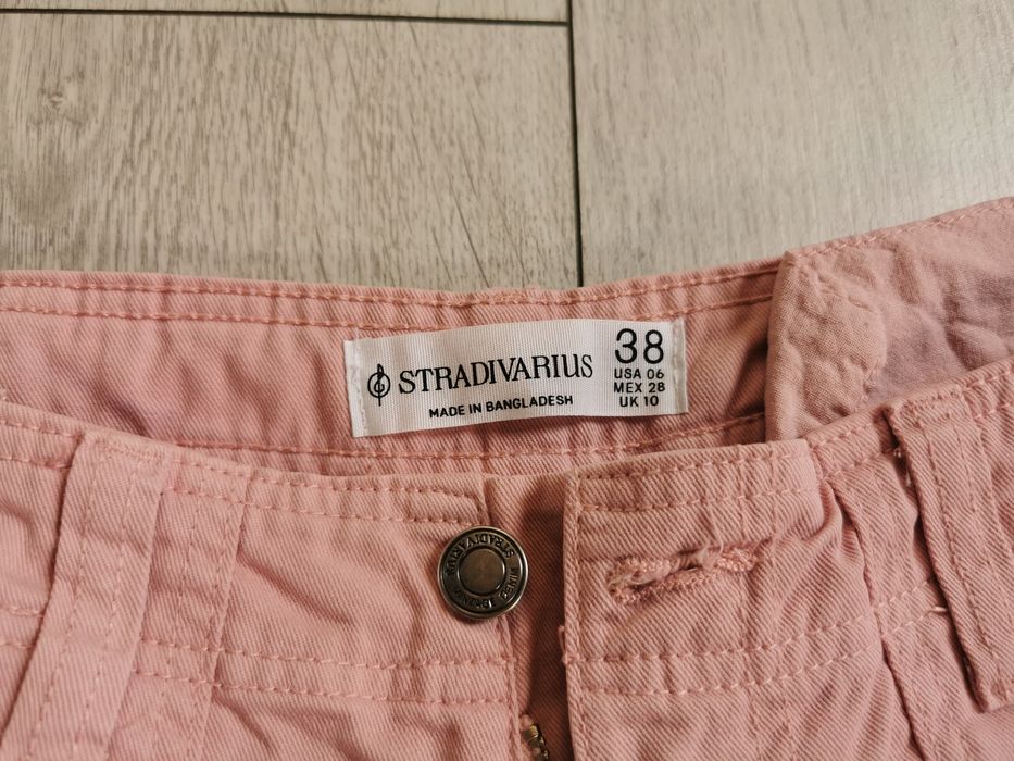Szerokie spodnie różowe damskie 38 Stradivarius