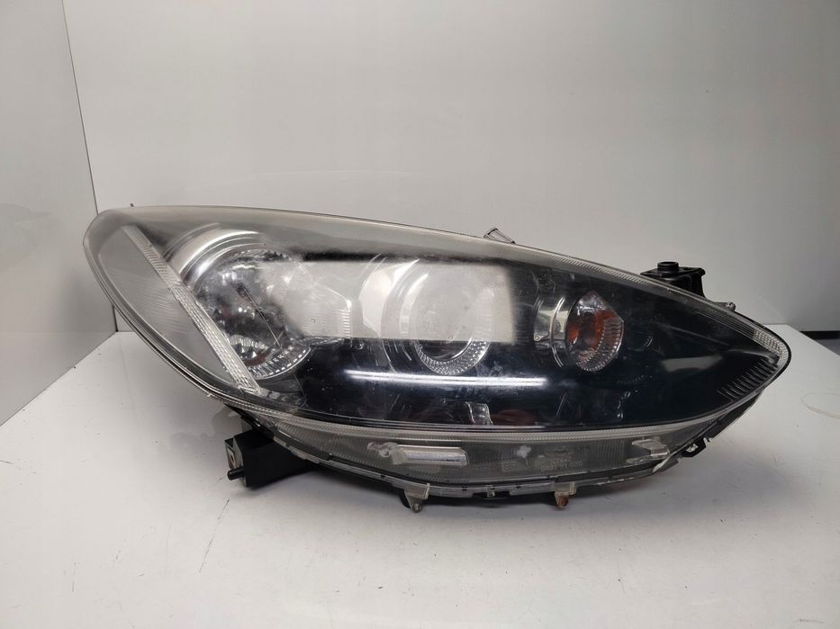 mazda 2 de 2011r reflektor lampa prawy przód prawa przednia soczewka