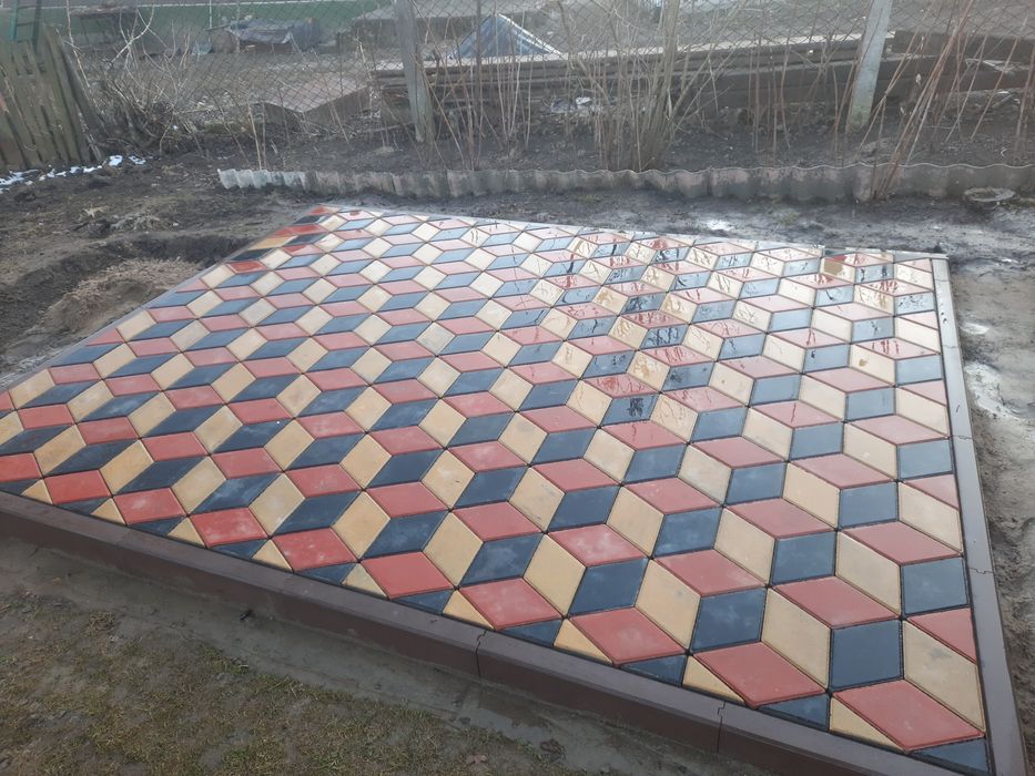 Укладка,тротуарної плитки бруківки.