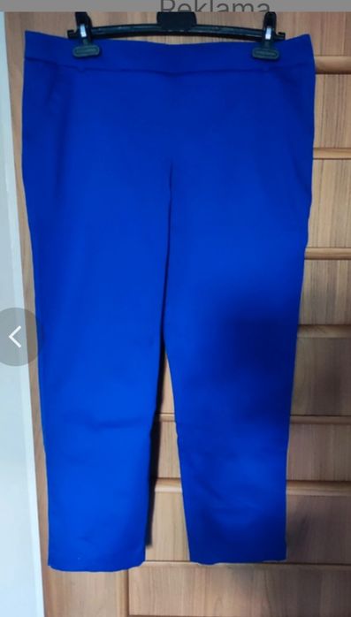 Piękne chabrowe spodnie firmy Quiosque rozmiar 40.