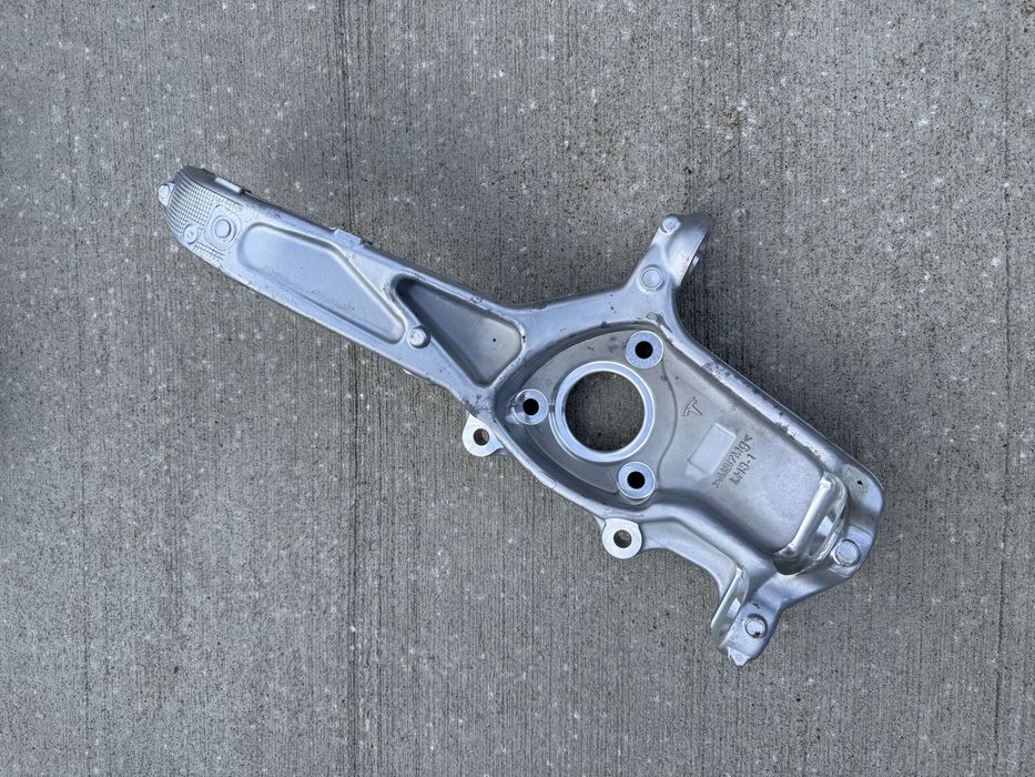 ОРИГІНАЛ Кулак поворотний передній, цапфа Tesla model 3 - 1044311-00-Е