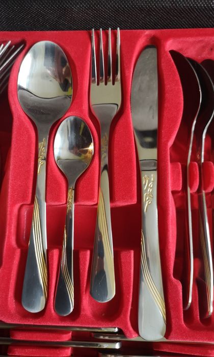 Zestaw sztućców na dla 12 osób - 72 elementy walizka w walizce Unistar