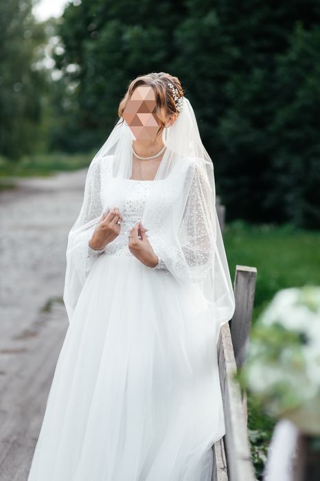 Ніжна весільна сукня