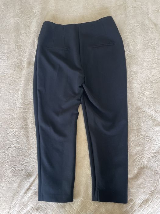 Брюки з високою посадкою