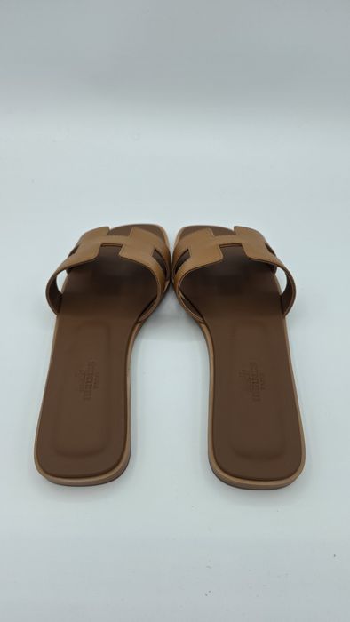 Hermes oran sandálias gold