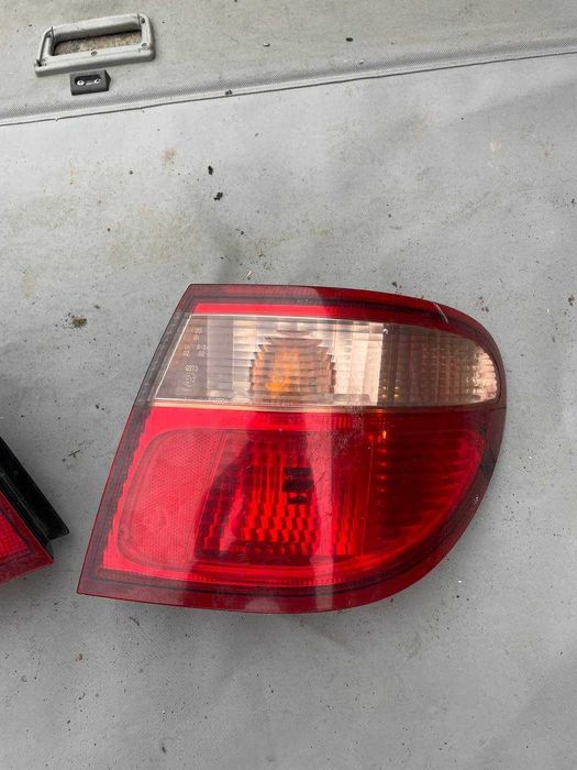 Стопи ліхтарі лівий правий Nissan Almera N16 2000-2006 седан Фонарь