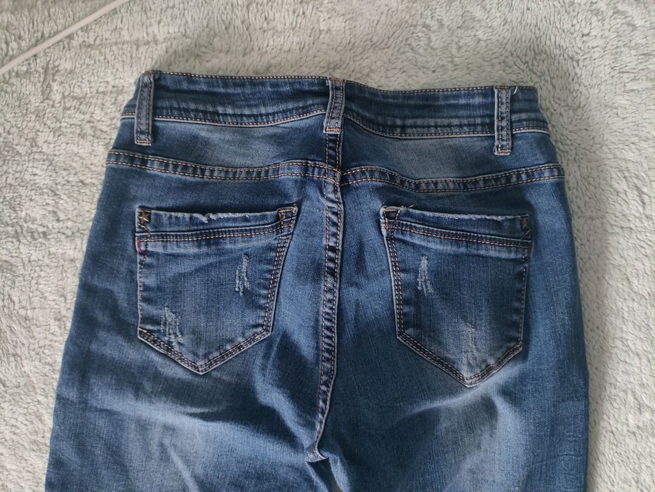 Damskie jeansy 38