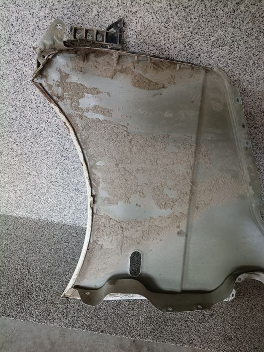 Błotnik prawy VW transporter T5 brak kodu lakieru