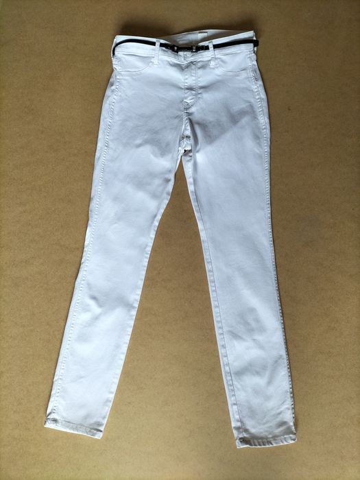 Białe spodnie skinny H&M