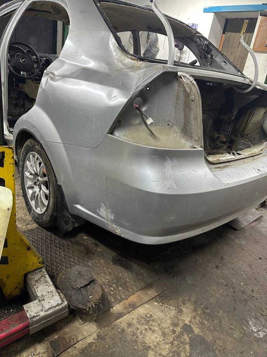 Задний бампер Шевроле Авео т250