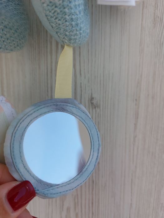 Іграшка на автокрісло коляску