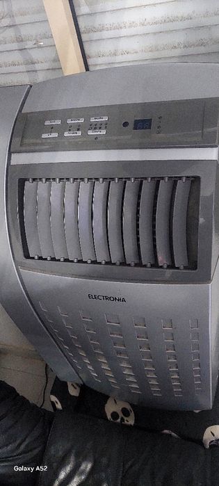 Ar condicionado impecável