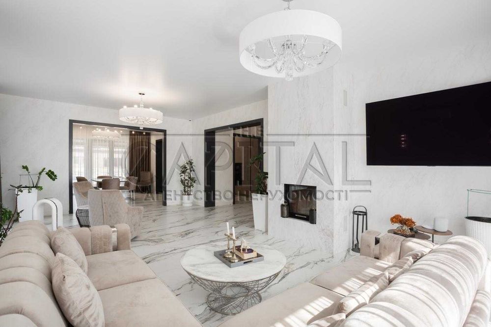 Продам автономний будинок 320м2 з бомбосховищем/басейном в с.Щасливе