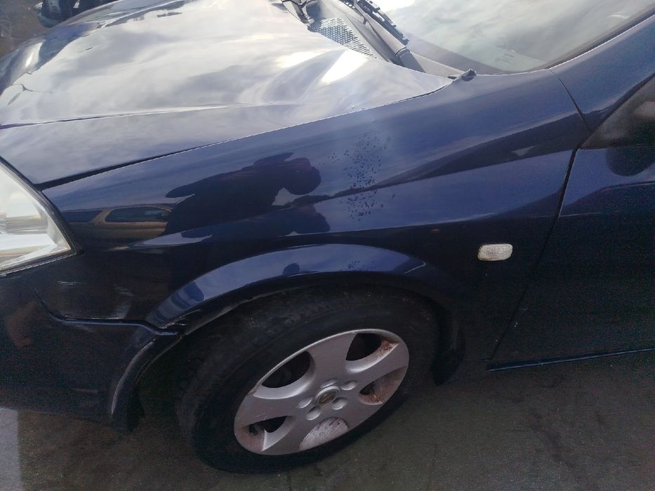 Guarda-lamas esquerdo NISSAN Primera Hatchback (P12)