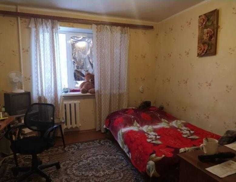 Продам гостинку со своим санузлом и мини-кухней в районе Одесской.