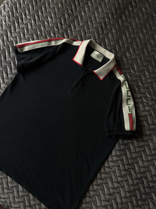 Поло Gucci.