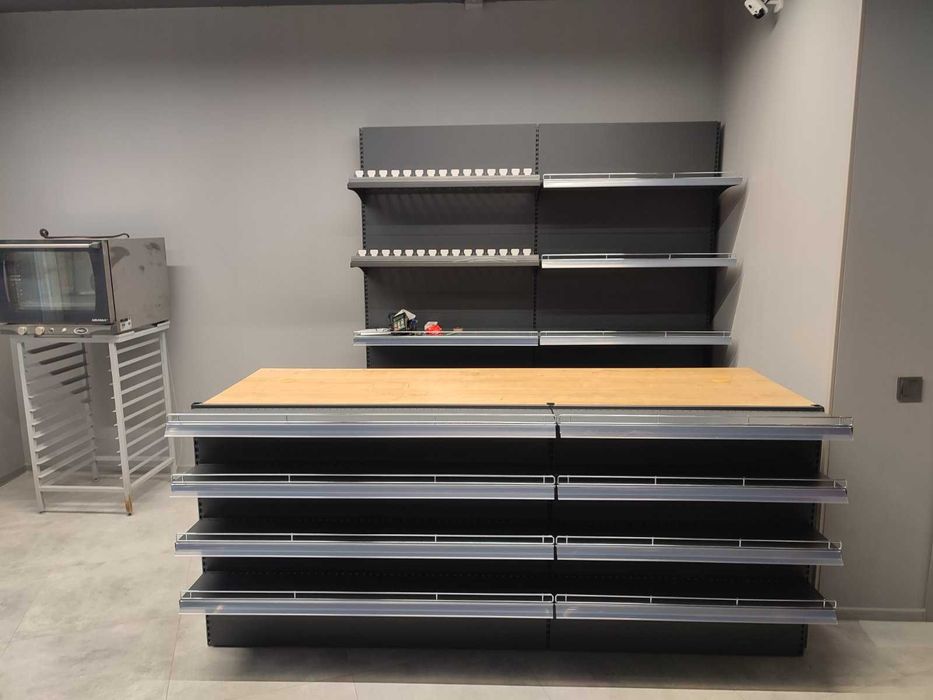 Торгові стелажі для магазинів. Торгове обладнання. Касові прилавки