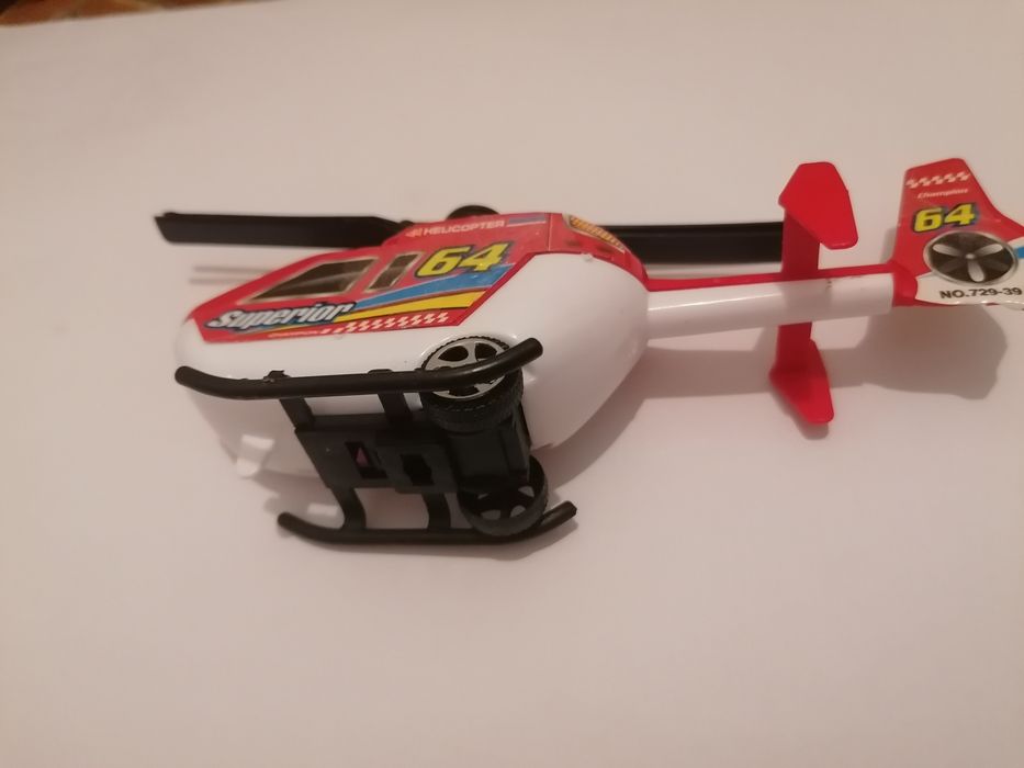 Helicóptero te brinquedo com rodas de fricção