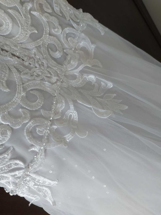 Delikatna suknia ślubna