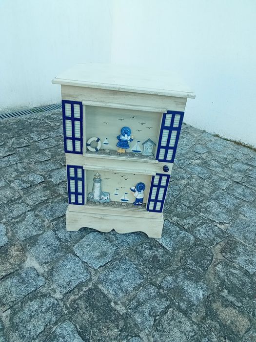 Móvel decorativo alusivo praia