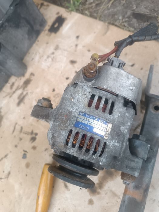 Alternator Kubota D1105 V1505 D722 Oryginalny Denso 16678-64012
