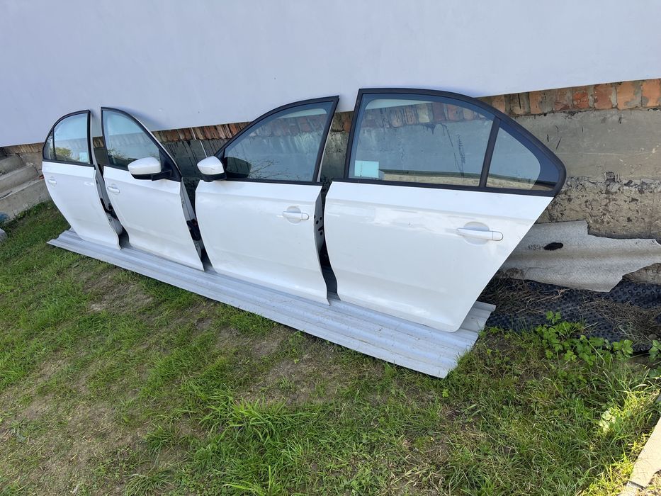 Двері шкода Рапід Skoda Rapid