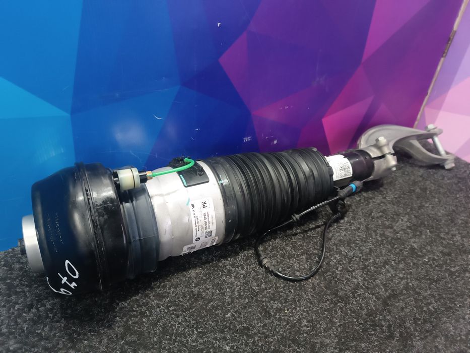 Пневмостійка передня ліва BMW G07 37106869035 Пневмостойка Балон