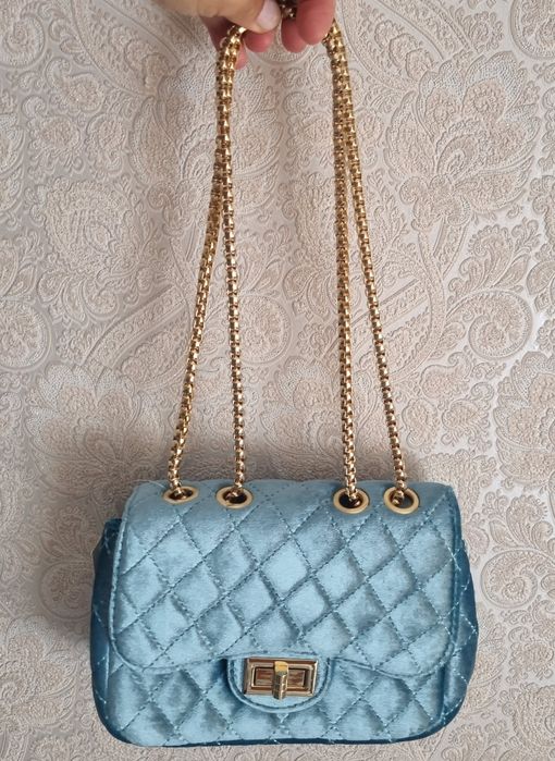 Mala de veludo azul celeste