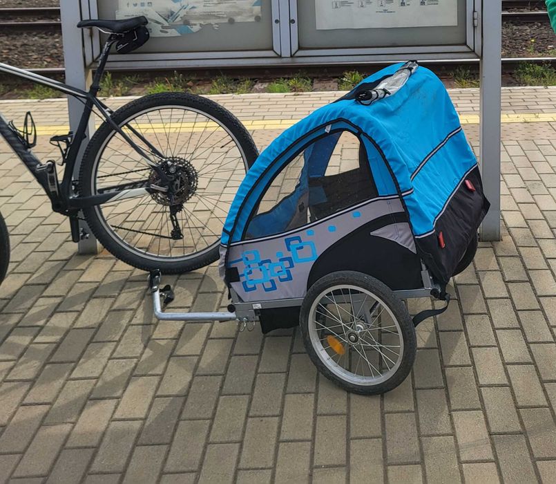 Przyczepka rowerowa (niebieska) -dla 1 lub 2 dzieci - stan idealny