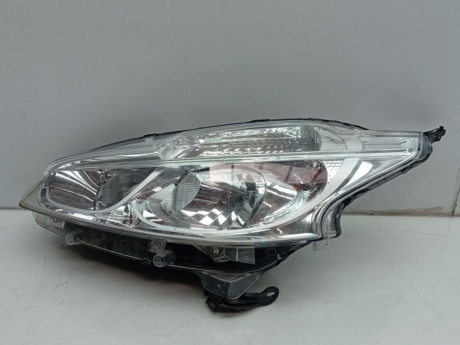 Ótica / farol esquerda PEUGEOT 208