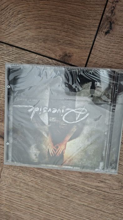 Płyty CD Riverside z autografami