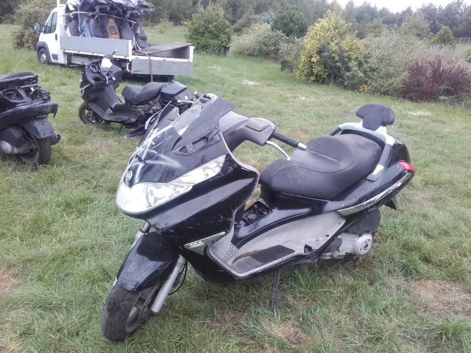 Piaggio x8 x 8 silnik lagi owiewka lampa koło felga tarcza części