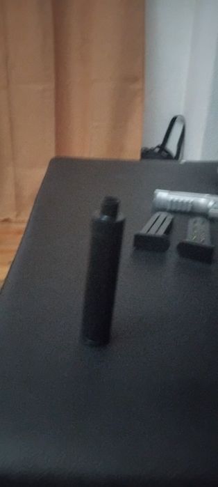 Arma de airsoft nova