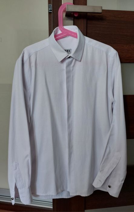 Sprzedam elegancką koszulę białą dla chłopca 152 cm