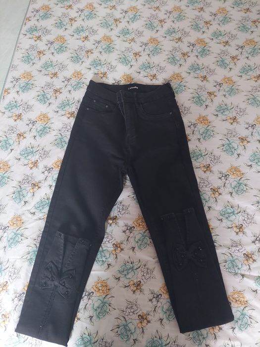 Calça mulher, preta 34, com lacinho atrás