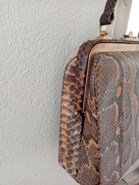 Mala de pele de cobra verdadeira