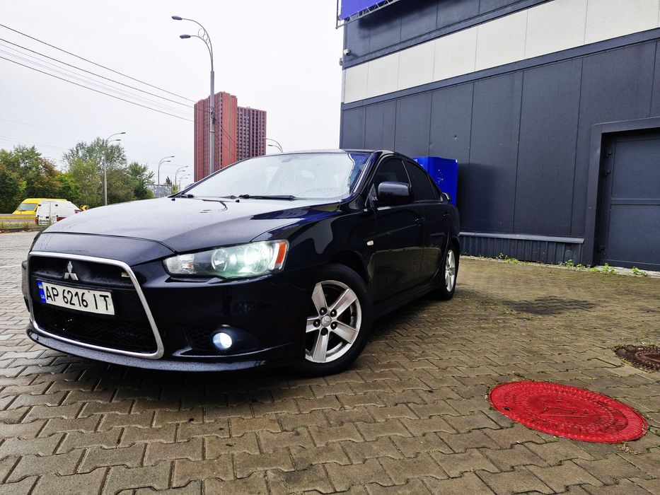 Митсубиши Лансер Х