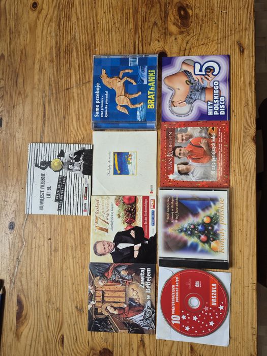 Płyty CD kolędy, film Mgła