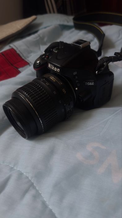 Nikon D5100 + 18–55mm VR + Battery Grip + Kit Completo